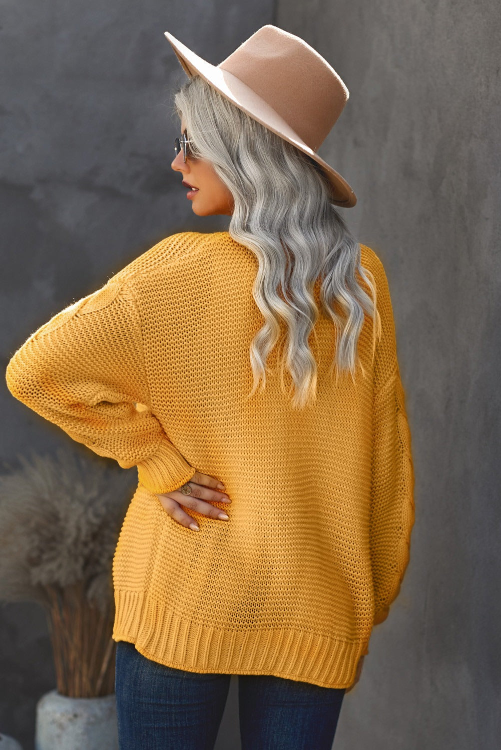 A stylish Women's Yellow Open Front Chunky Knit Cardigan featuring a slouchy fit and braided texture on sleeves, perfect for winter wear.