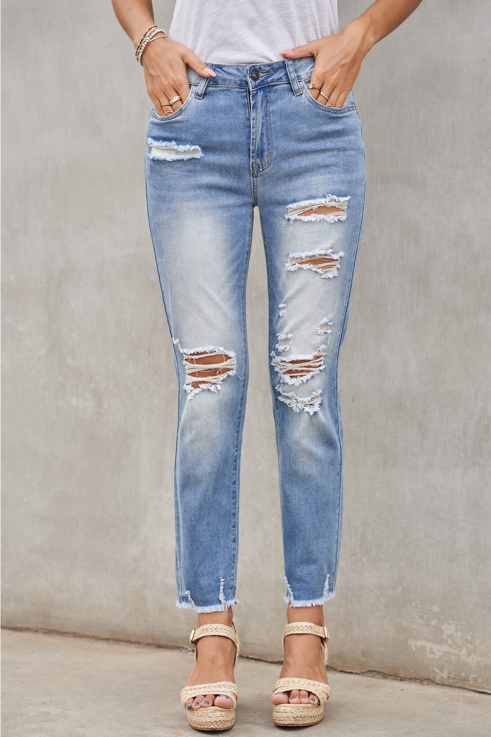 Fashion Light Blue Distressed Boyfriend Denim Pants featuring a medium rise fit, straight legs, and classic five-pocket design with distressed detailing.