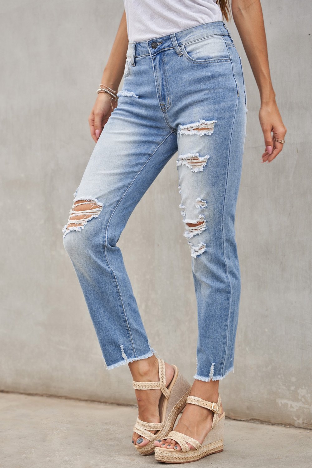 Fashion Light Blue Distressed Boyfriend Denim Pants featuring a medium rise fit, straight legs, and classic five-pocket design with distressed detailing.