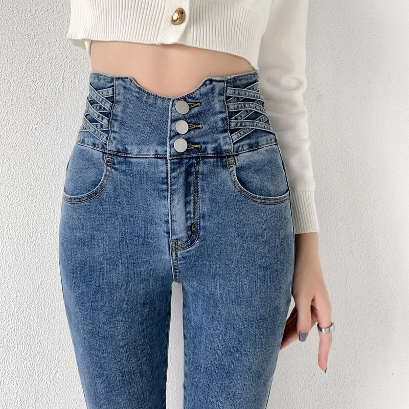 Skinny pencil jeans featuring a vintage high waist design with four buttons, made from stretchy cotton denim, perfect for a stylish look.