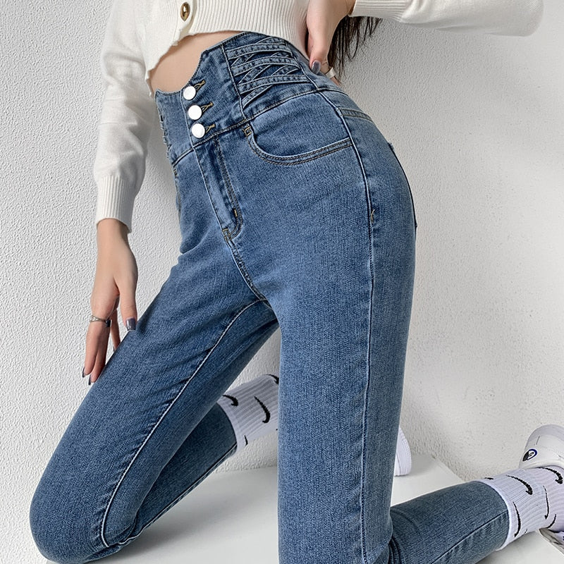 Skinny pencil jeans featuring a vintage high waist design with four buttons, made from stretchy cotton denim, perfect for a stylish look.