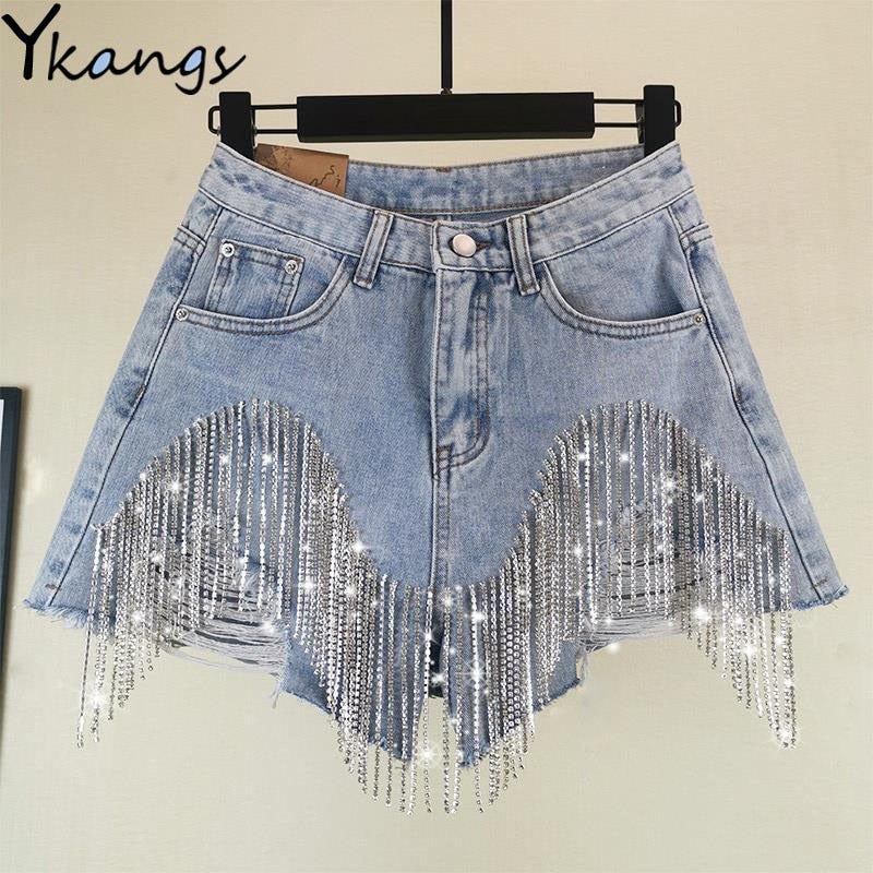 Women luxurious tassel rhinestone fringed hole jeans shorts, high waist design, showcasing stylish details and a flattering fit.