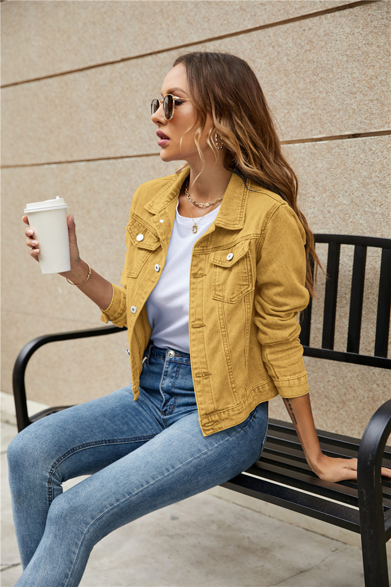 A stylish women's denim jacket featuring long sleeves, a slim fit, and a solid pattern, perfect for casual wear in fall and winter.