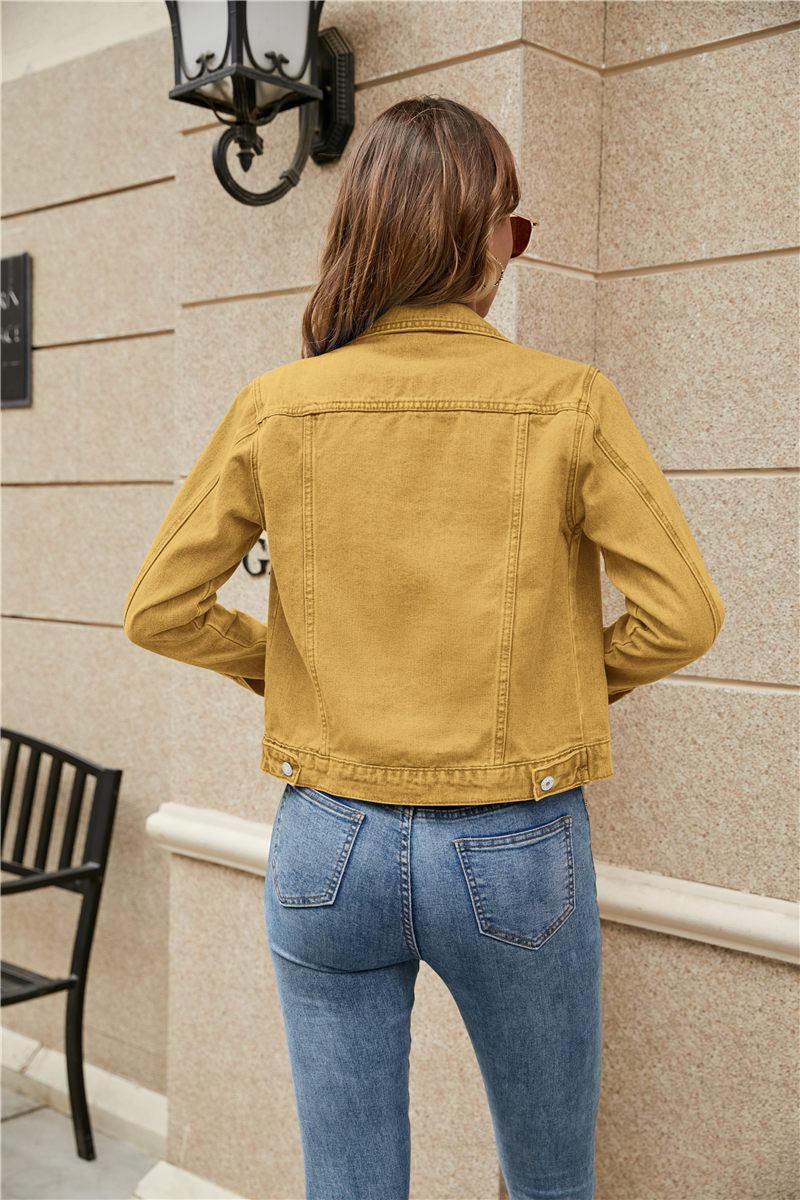 A stylish women's denim jacket featuring long sleeves, a slim fit, and a solid pattern, perfect for casual wear in fall and winter.