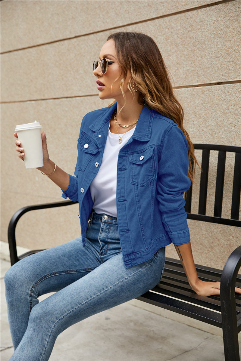 A stylish women's denim jacket featuring long sleeves, a slim fit, and a solid pattern, perfect for casual wear in fall and winter.