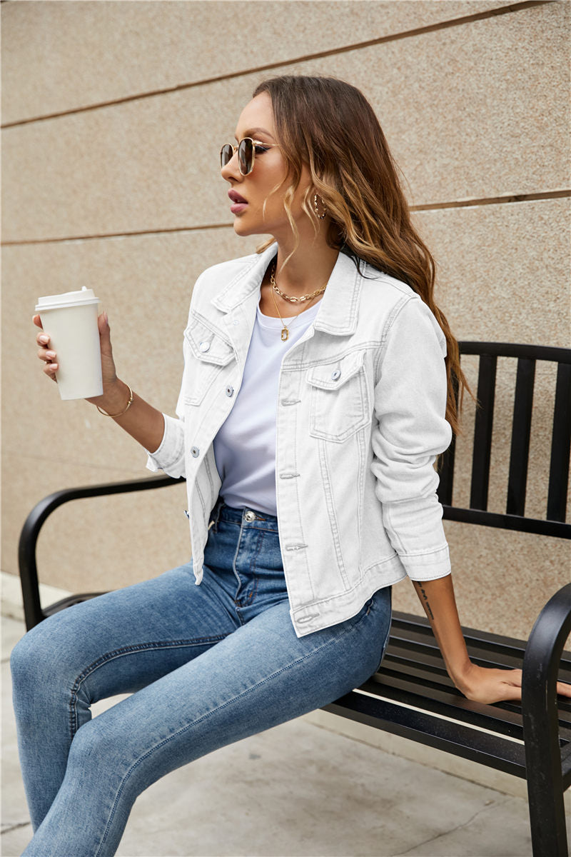 A stylish women's denim jacket featuring long sleeves, a slim fit, and a solid pattern, perfect for casual wear in fall and winter.