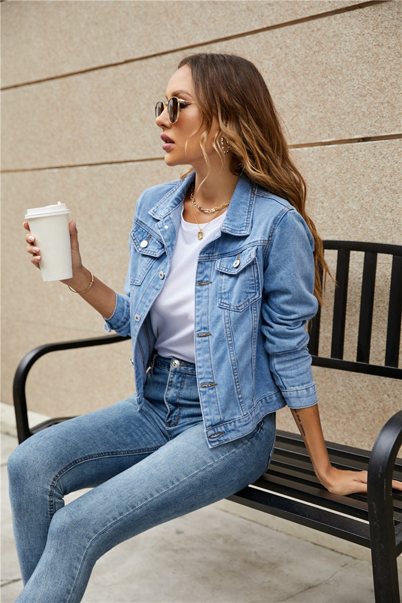 A stylish women's denim jacket featuring long sleeves, a slim fit, and a solid pattern, perfect for casual wear in fall and winter.