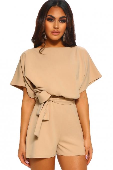 Apricot short sleeve belted playsuit featuring batwing sleeves and a stylish tie waist belt, perfect for summer outings.