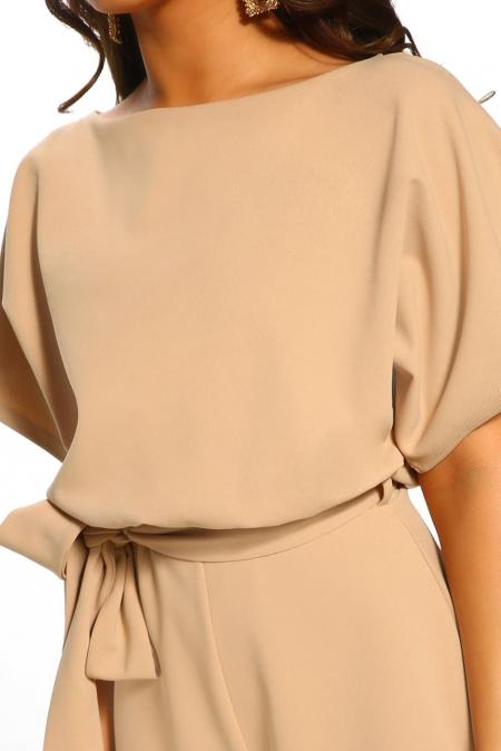 Apricot short sleeve belted playsuit featuring batwing sleeves and a stylish tie waist belt, perfect for summer outings.