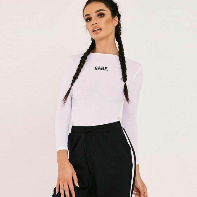 A stylish BABE Letter Long Sleeved Bodysuit in casual design, featuring a trendy letter print and made from soft polyester material.