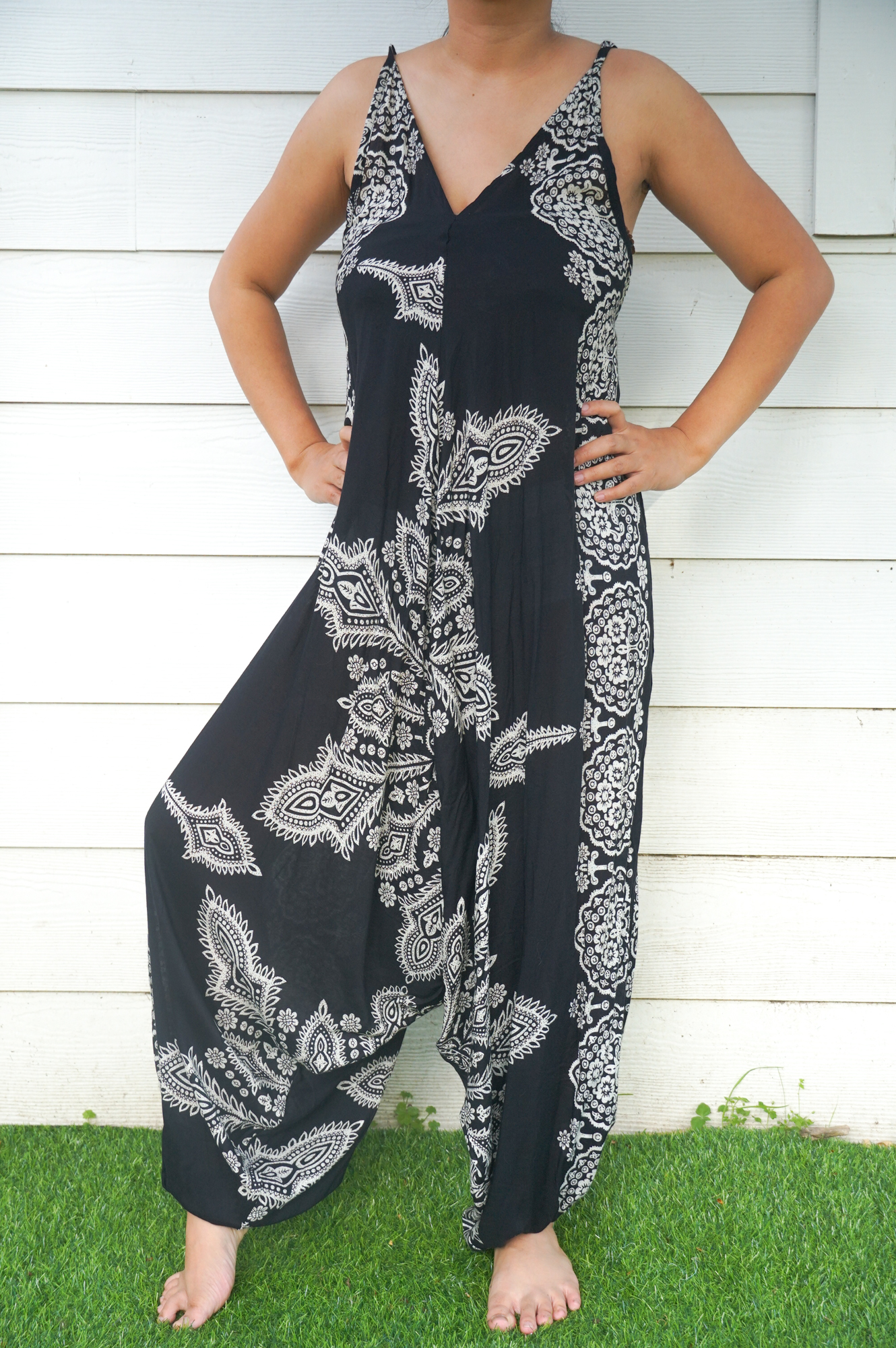 Black Butterfly Hippie Jumpsuit featuring wide legs and adjustable straps, perfect for festivals and summer wear.