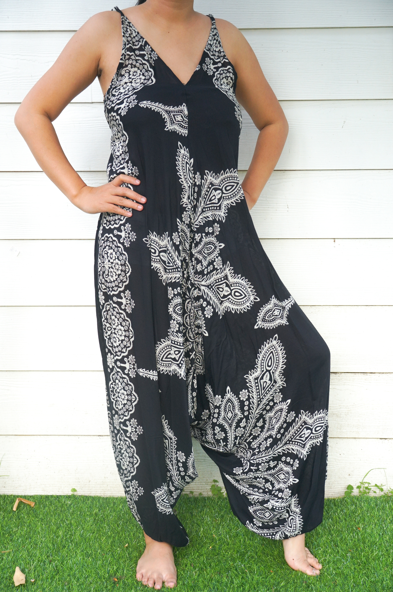 Black Butterfly Hippie Jumpsuit featuring wide legs and adjustable straps, perfect for festivals and summer wear.