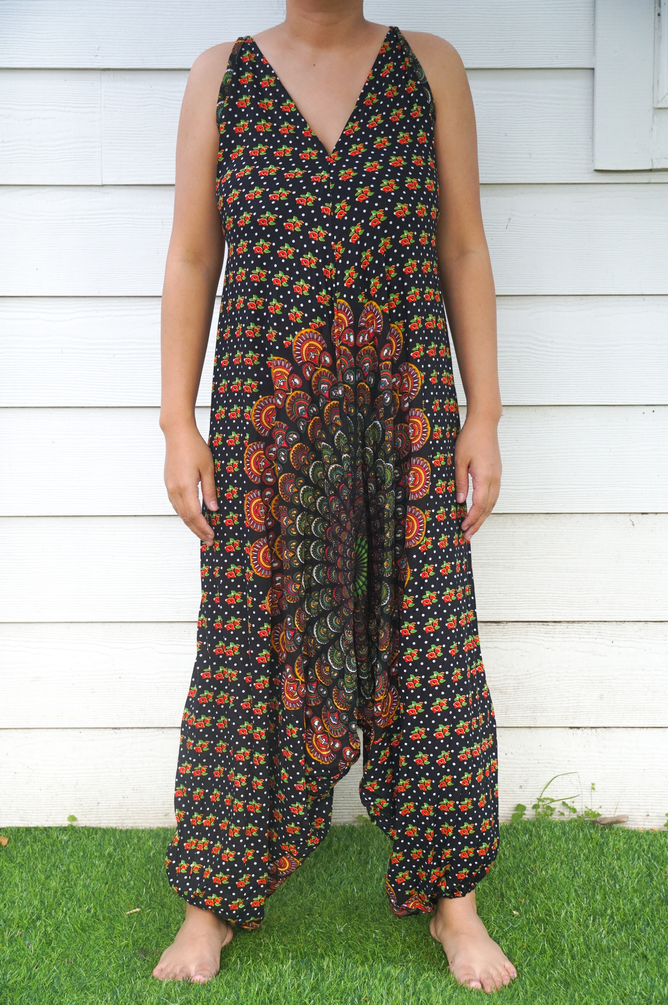 Black Chakra Hippie Jumpsuit featuring wide legs, adjustable straps, and elasticated back, perfect for festivals and summer wear.