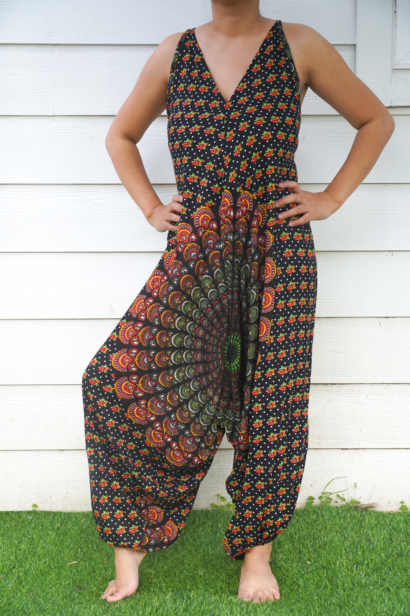 Black Chakra Hippie Jumpsuit featuring wide legs, adjustable straps, and elasticated back, perfect for festivals and summer wear.