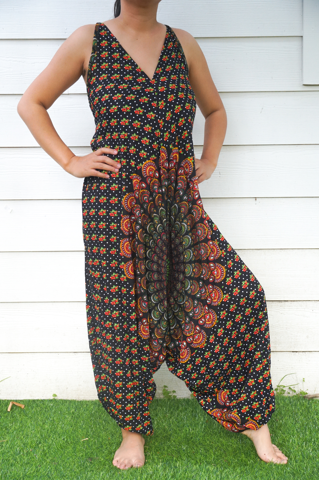 Black Chakra Hippie Jumpsuit featuring wide legs, adjustable straps, and elasticated back, perfect for festivals and summer wear.