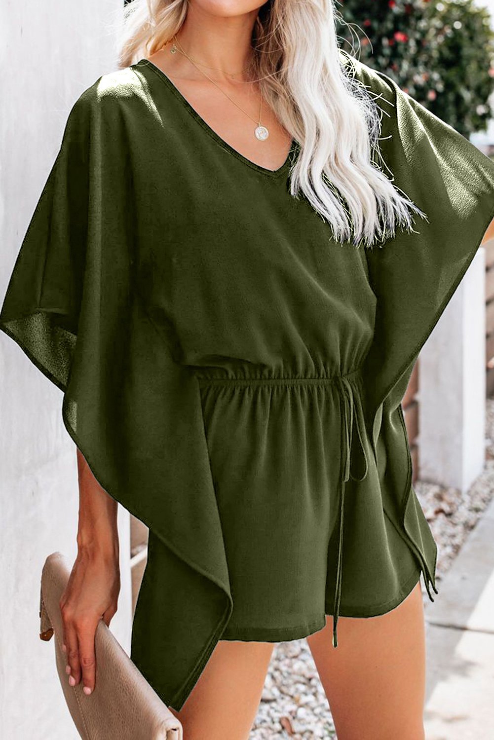 Casual Green Born To Fly Kimono Romper featuring half sleeves, draped sashes, and a solid green color, perfect for summer outings.