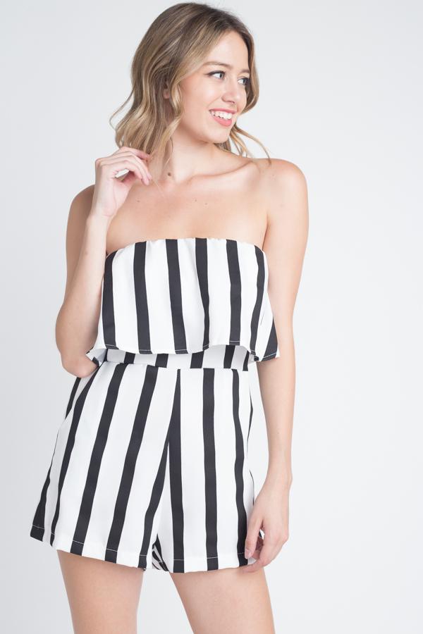 Women's strapless romper featuring a stylish stripe print and convenient pockets, perfect for summer outings.