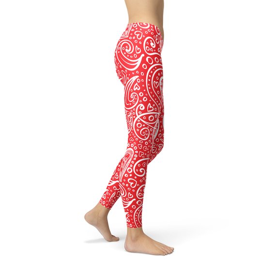 A pair of women's leggings featuring an abstract floral hearts design, showcasing vibrant colors and a stylish pattern, perfect for workouts or casual wear.