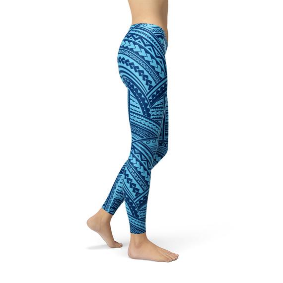 A pair of Blue Maori Leggings featuring vibrant, unique graphic designs, showcasing their full-length style and high-performance fabric.