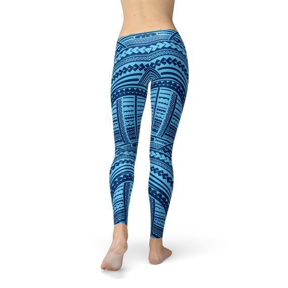 A pair of Blue Maori Leggings featuring vibrant, unique graphic designs, showcasing their full-length style and high-performance fabric.