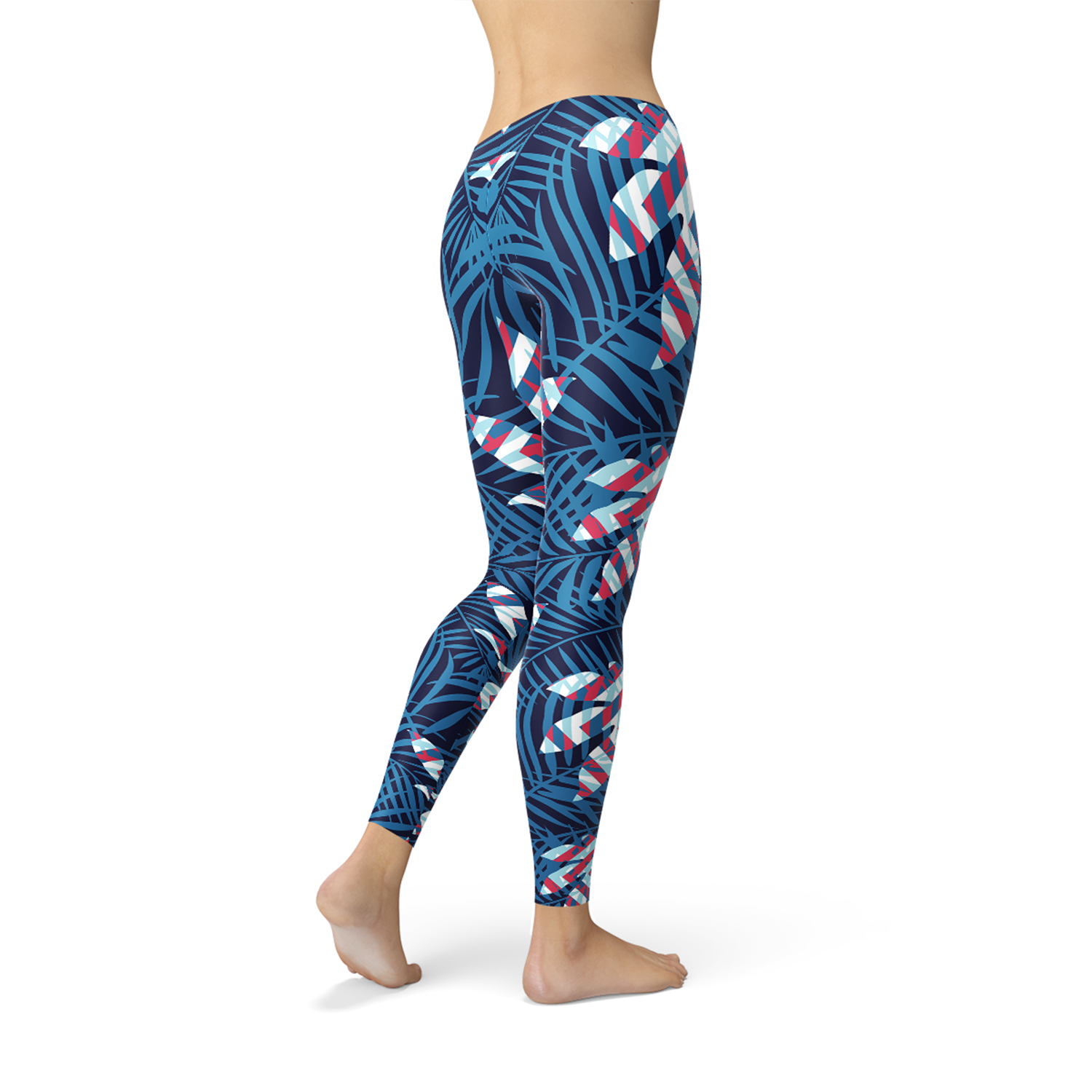 A pair of women's blue tropical leaf leggings featuring a vibrant design, perfect for workouts and casual wear.