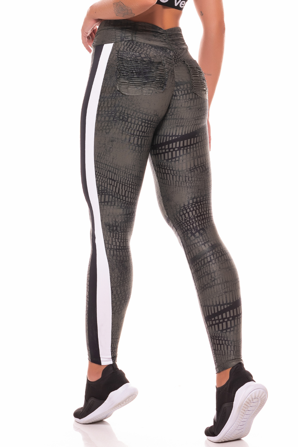 Croc Push Up Legging featuring a unique green and black crocodile print, designed for comfort and style with a draped waistband and back pockets.