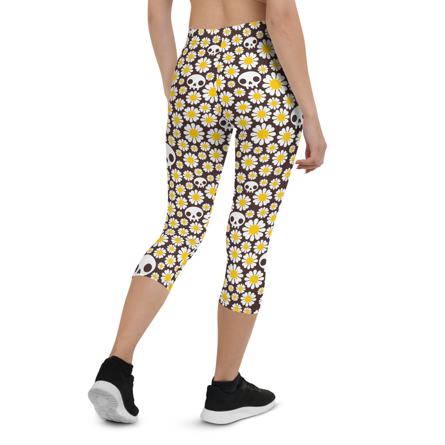 Daisies and Skulls Capri Leggings for Women featuring a vibrant floral and skull design, perfect for workouts and casual wear.