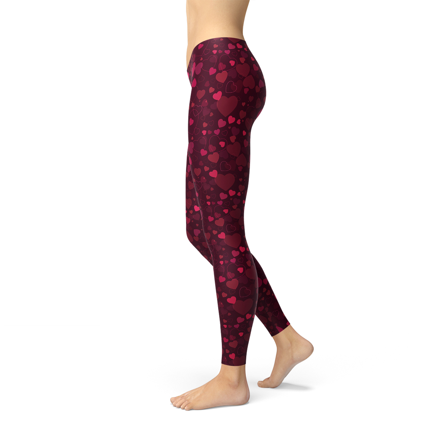 A pair of vibrant red women's leggings featuring a unique hearts design, showcasing their four-way stretch and squat-proof quality, perfect for workouts and casual wear.