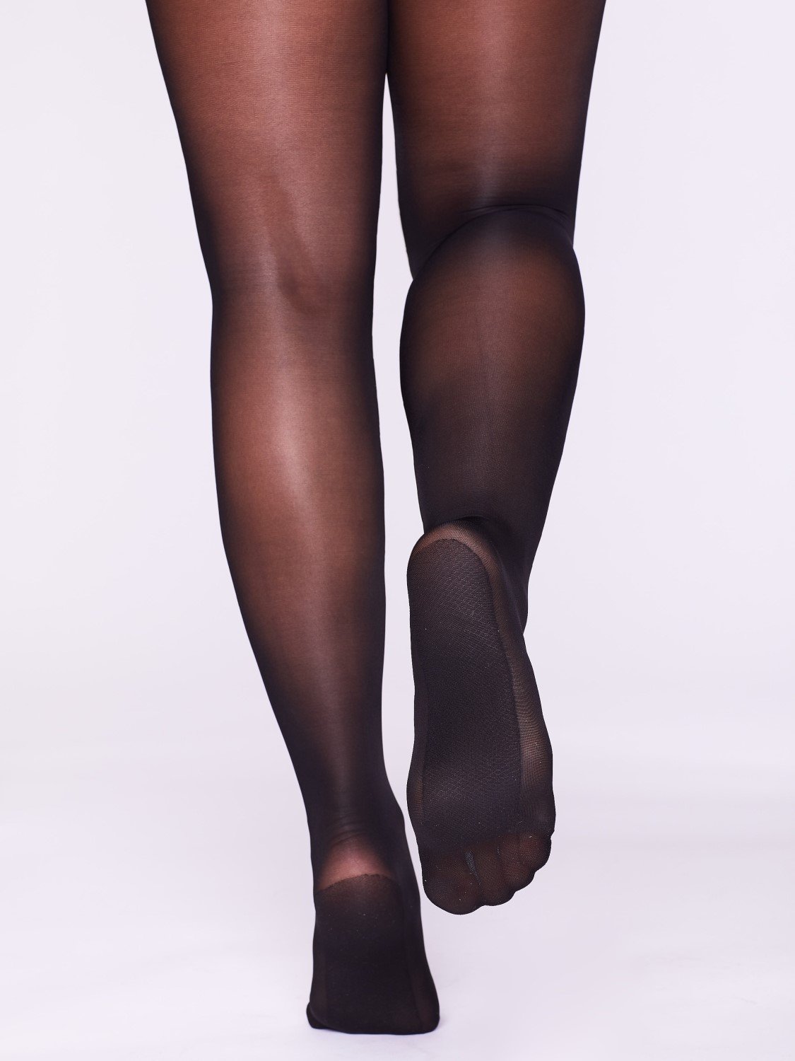 Hosetess Magic Lift shapewear support stockings featuring a shiny finish and broad waistband, designed for comfort and graduated compression.