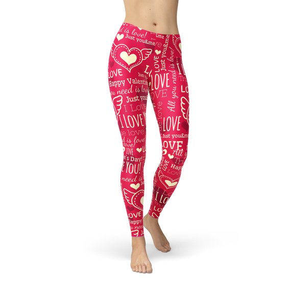 A pair of vibrant red leggings featuring unique heart designs, showcasing their premium quality and stylish look, perfect for workouts and casual wear.