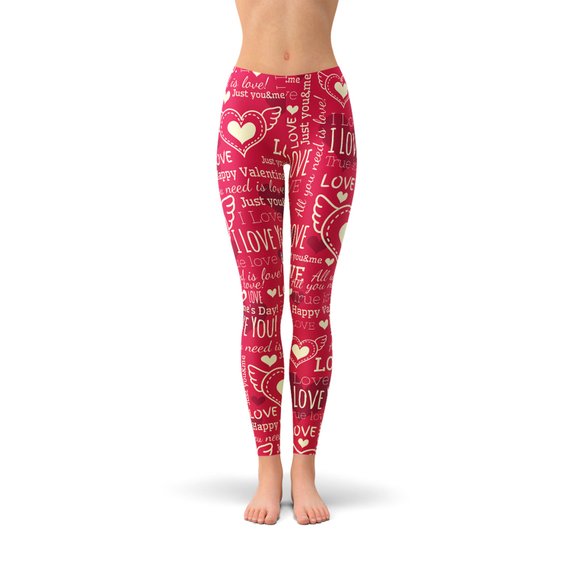 A pair of vibrant red leggings featuring unique heart designs, showcasing their premium quality and stylish look, perfect for workouts and casual wear.