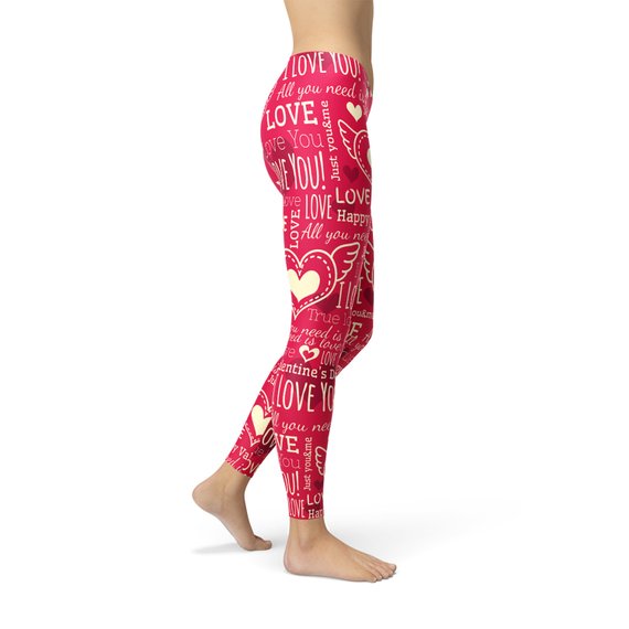 A pair of vibrant red leggings featuring unique heart designs, showcasing their premium quality and stylish look, perfect for workouts and casual wear.