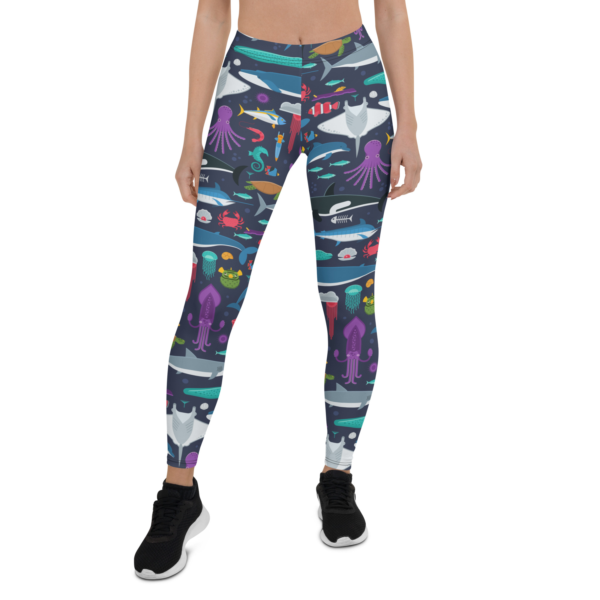 A pair of women's Marine Life leggings featuring vibrant ocean-themed graphics, designed for comfort and performance during workouts.