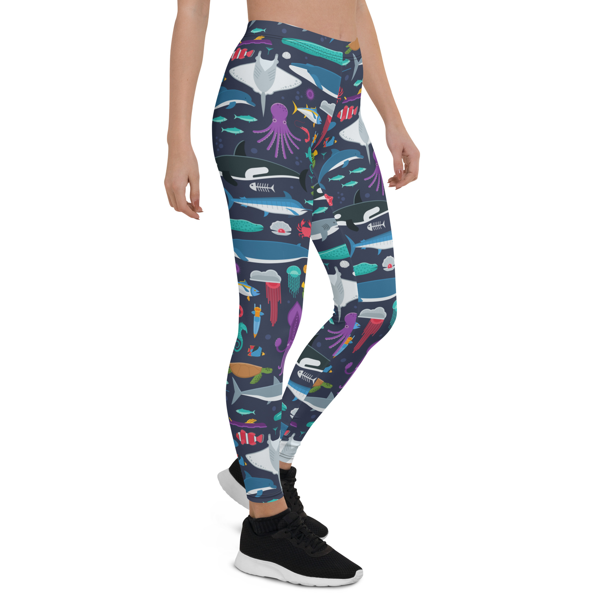 A pair of women's Marine Life leggings featuring vibrant ocean-themed graphics, designed for comfort and performance during workouts.