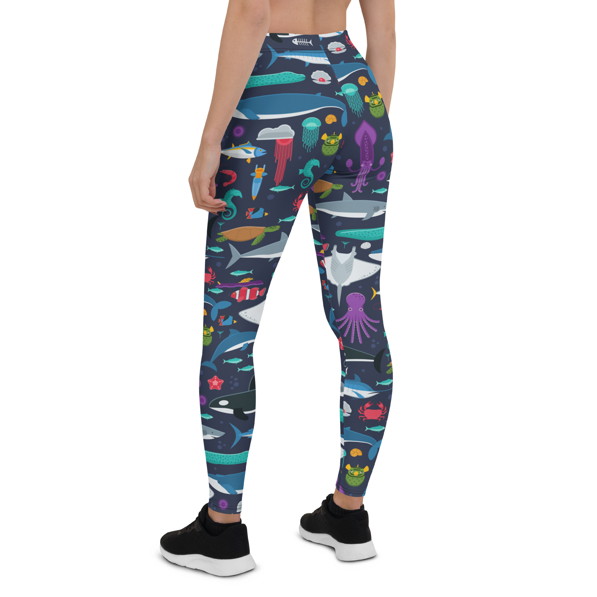 A pair of women's Marine Life leggings featuring vibrant ocean-themed graphics, designed for comfort and performance during workouts.