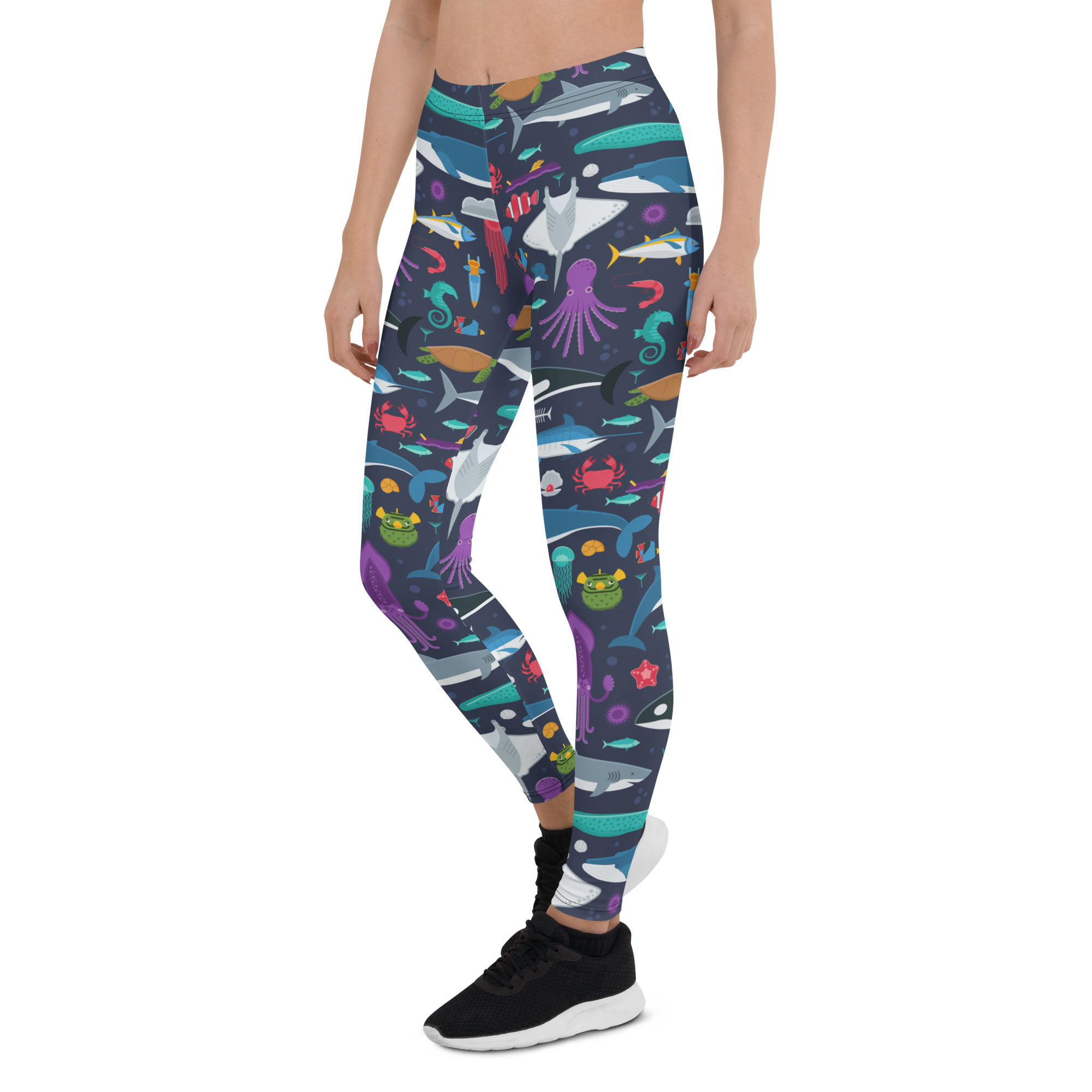 A pair of women's Marine Life leggings featuring vibrant ocean-themed graphics, designed for comfort and performance during workouts.