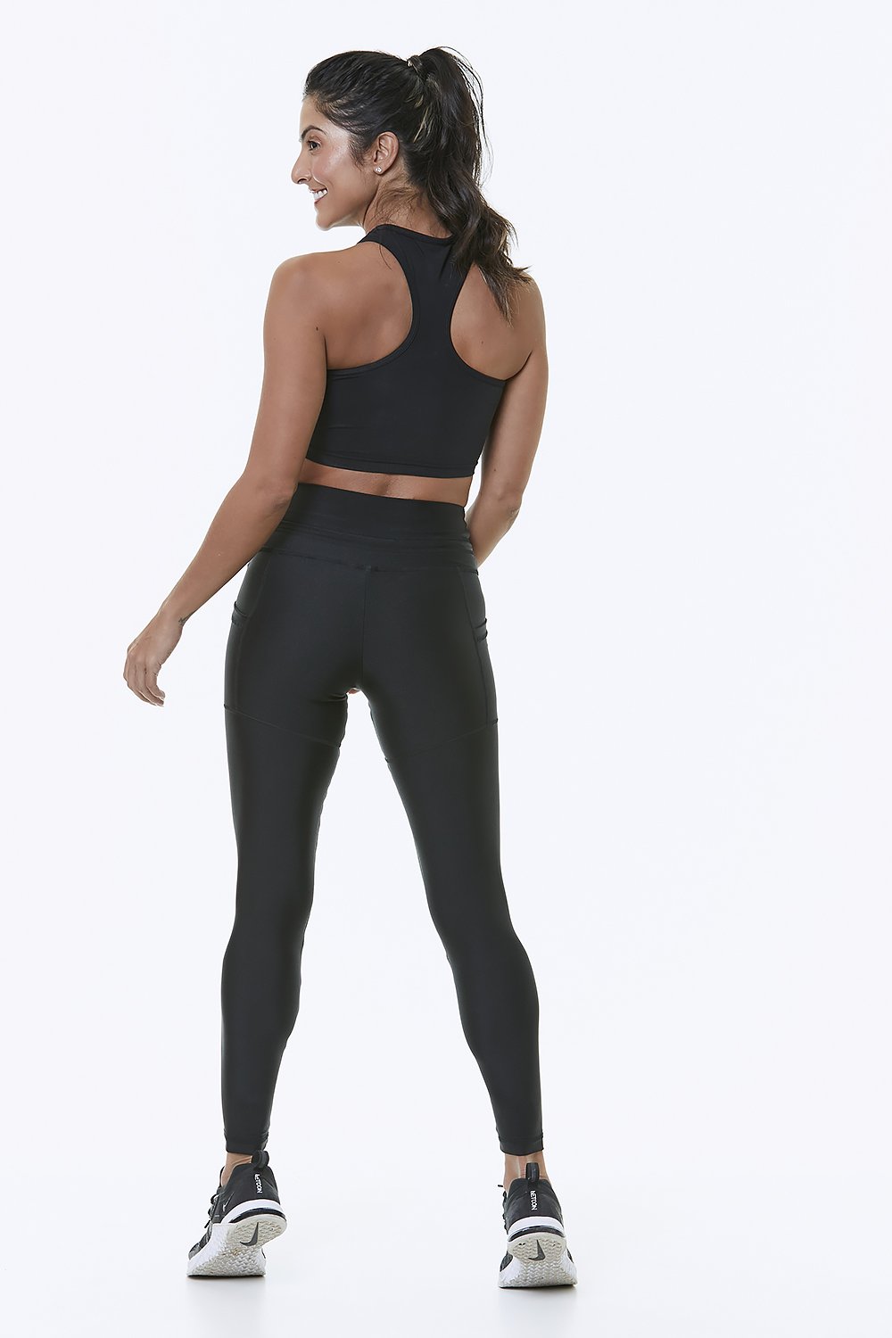 Maya Black Shiny Leggings showcasing a glossy finish and high waistband, perfect for stylish and comfortable wear.