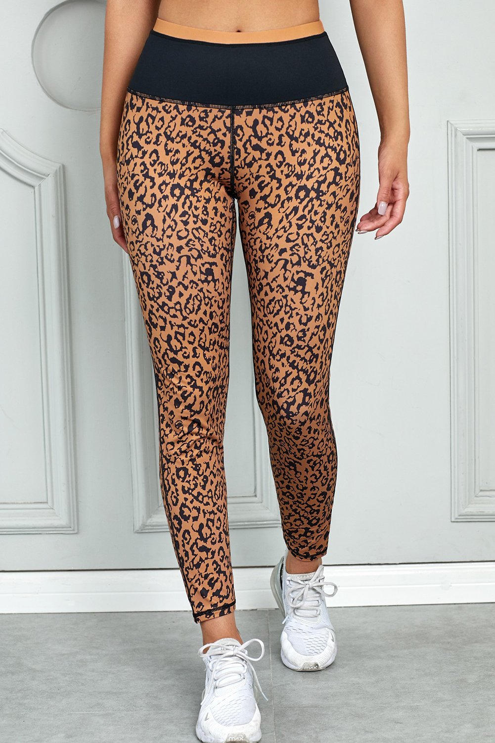 Mocha leopard print active yoga leggings with wide waistband, designed for comfort and style during workouts.