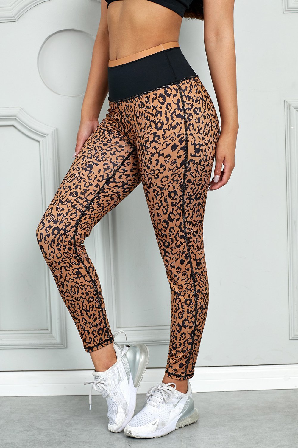 Mocha leopard print active yoga leggings with wide waistband, designed for comfort and style during workouts.