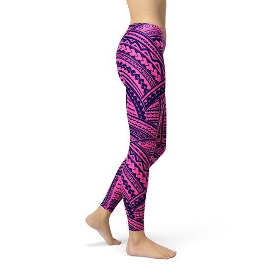 A pair of stylish Purple Maori Leggings featuring vibrant graphic designs, perfect for workouts and casual wear, showcasing their four-way stretch and squat-proof fabric.