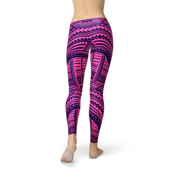 A pair of stylish Purple Maori Leggings featuring vibrant graphic designs, perfect for workouts and casual wear, showcasing their four-way stretch and squat-proof fabric.