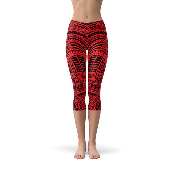 Red Maori Capri Leggings featuring vibrant graphic designs, perfect for workouts and casual wear.