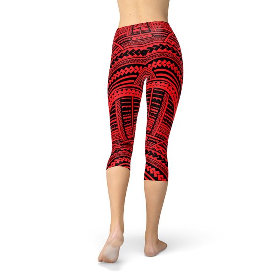 Red Maori Capri Leggings featuring vibrant graphic designs, perfect for workouts and casual wear.