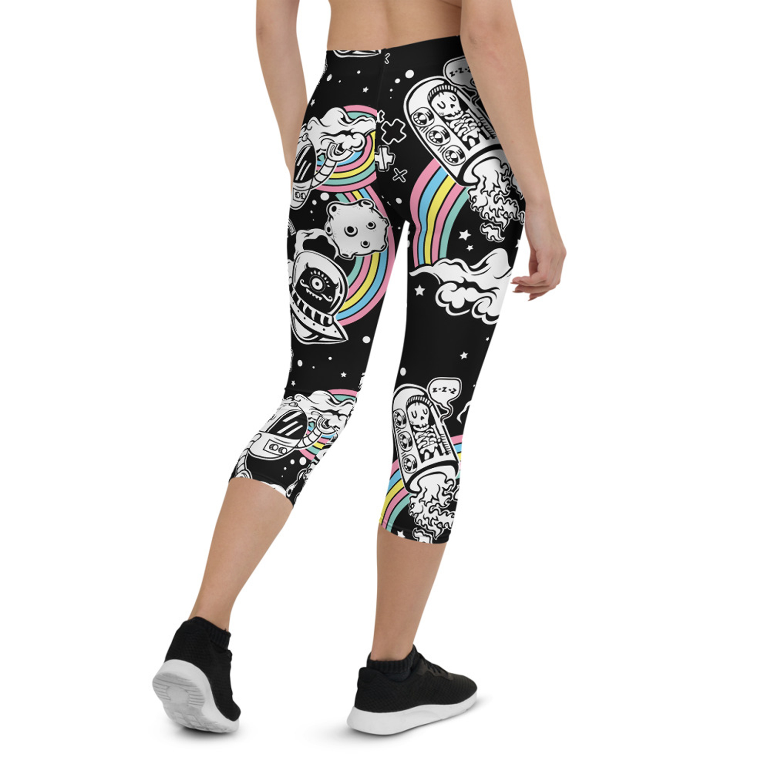 A pair of stylish Space Capri Leggings for Women featuring unique graphic designs, perfect for workouts and casual wear.