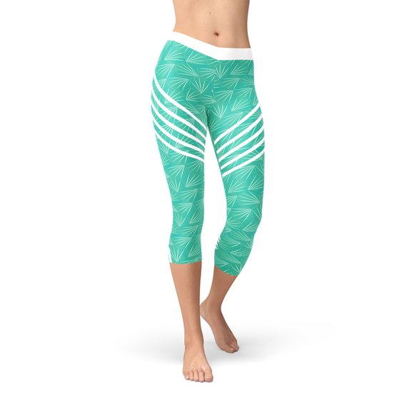 Turquoise Sports Capri Leggings featuring a unique graphic design, perfect for workouts and casual wear.