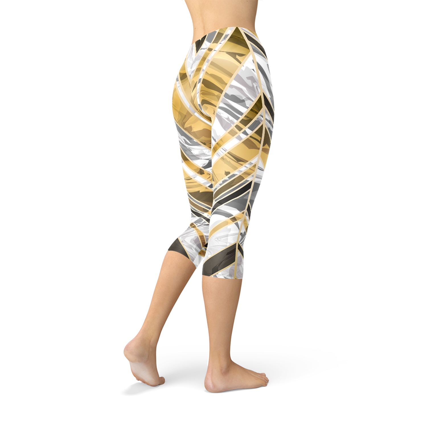 White marble capri leggings with black gold lines, showcasing a stylish and unique design for women's activewear.