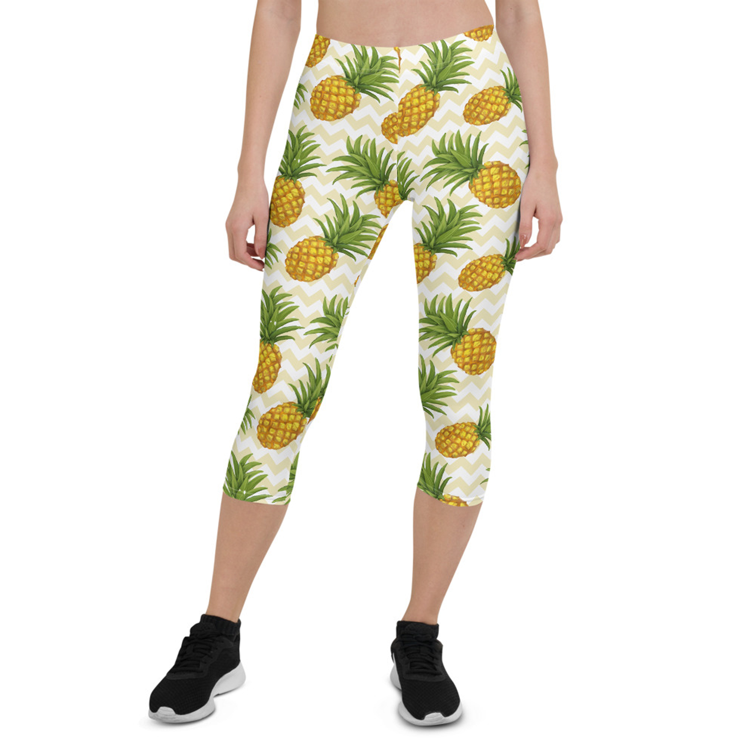 Women Pineapple Capri Leggings featuring vibrant pineapple design, perfect for workouts and casual wear.