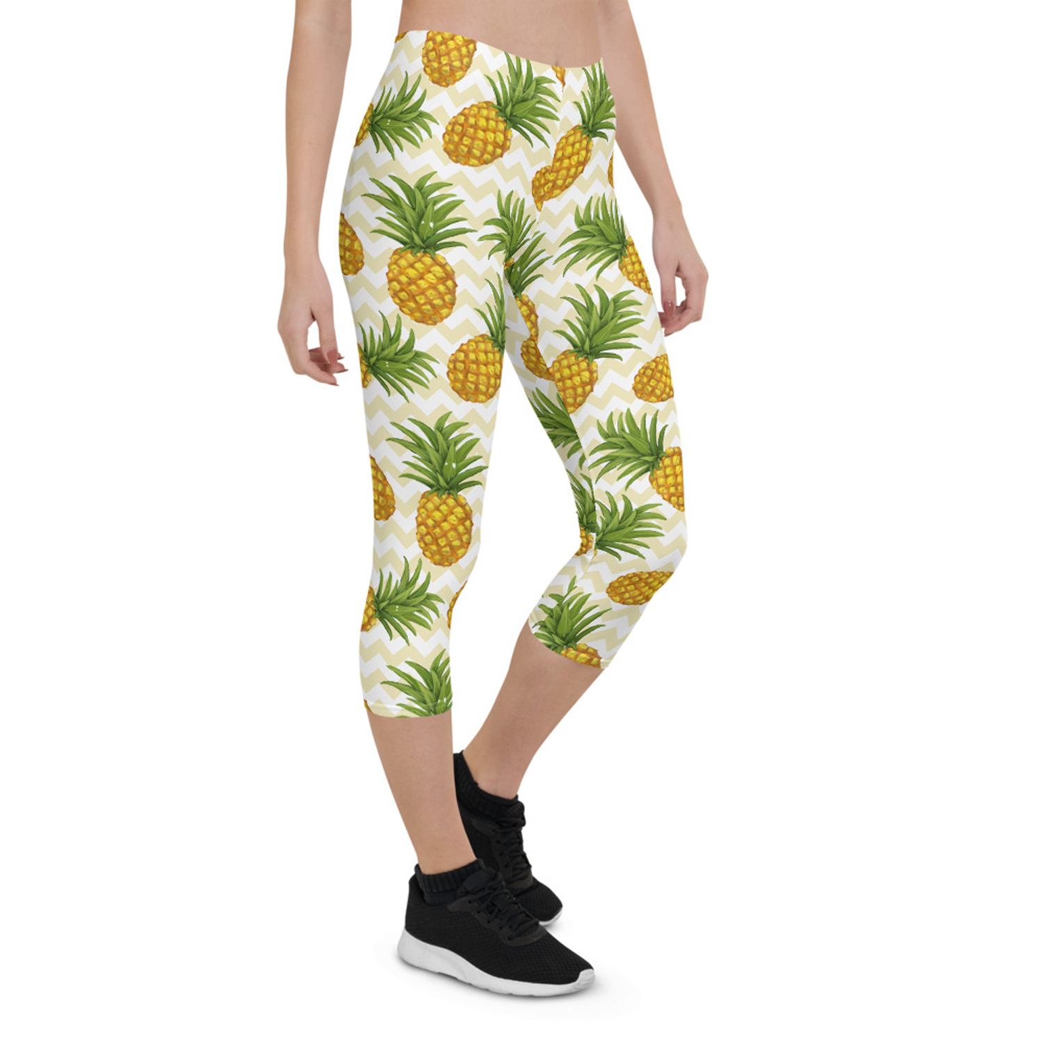 Women Pineapple Capri Leggings featuring vibrant pineapple design, perfect for workouts and casual wear.