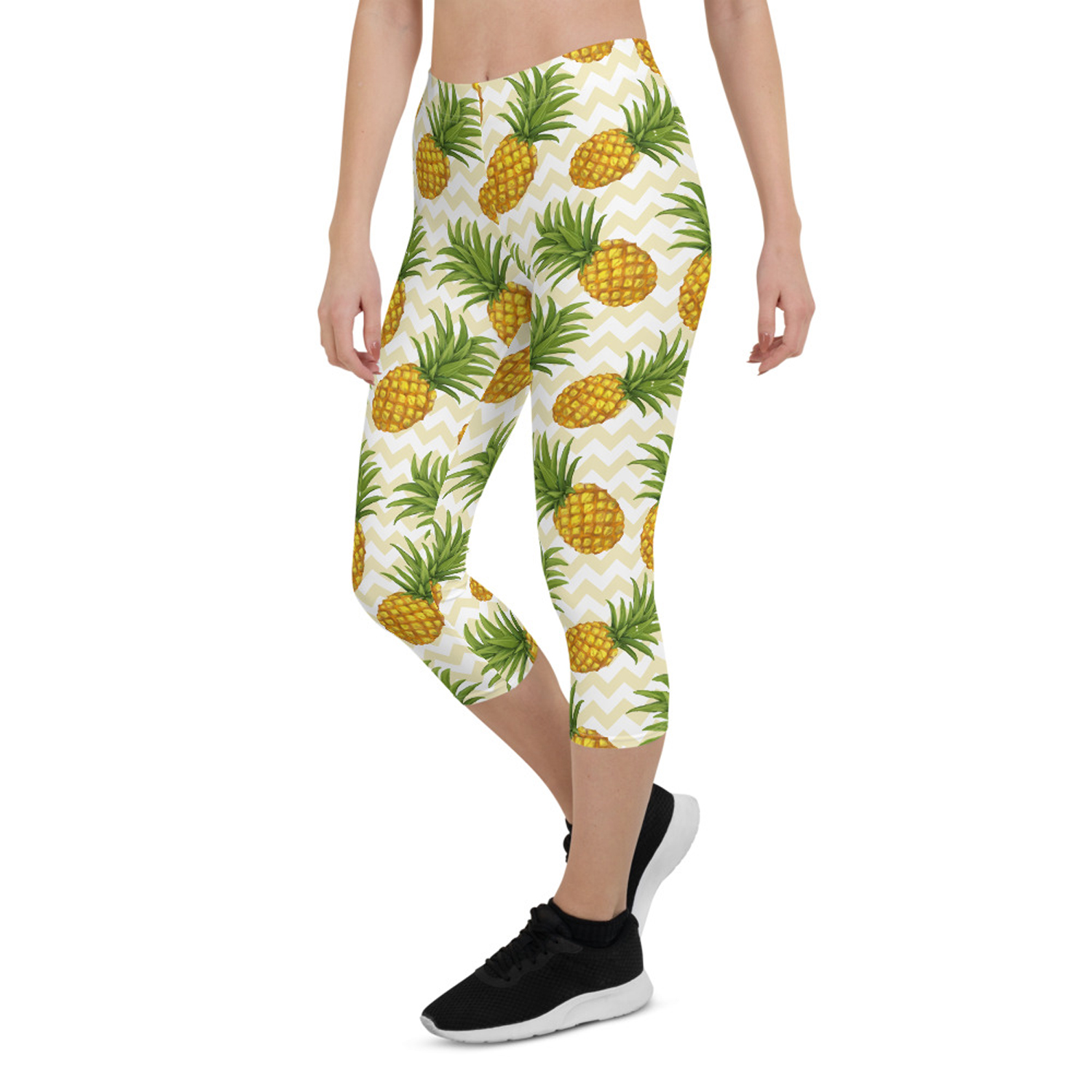 Women Pineapple Capri Leggings featuring vibrant pineapple design, perfect for workouts and casual wear.