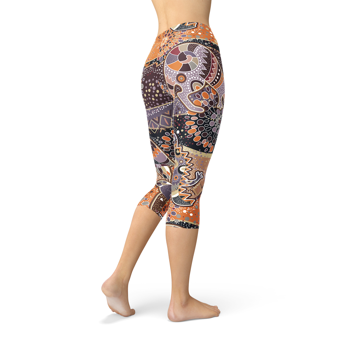 Womens Aboriginal Dreamtime Capri Leggings featuring a vibrant, colorful design inspired by Aboriginal culture, made from high-performance fabric for comfort and style.